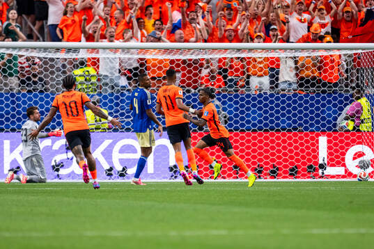 Crysencio Summerville of Netherlands celebrates