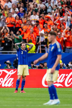 Victor Nilsson Lindelöf of Sweden looks dejected