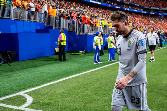 Goalkeeper Kristoffer Nordfeldt of Sweden looks dejected