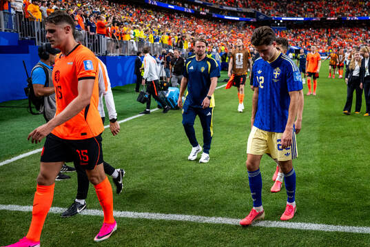 Besfort Zeneli of Sweden looks dejected