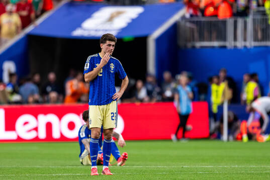 Besfort Zeneli of Sweden looks dejected