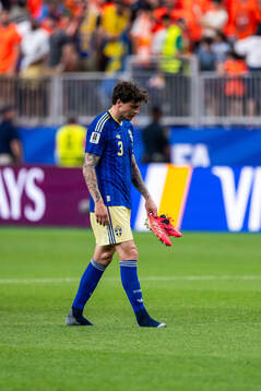 Victor Nilsson Lindelöf of Sweden looks dejected