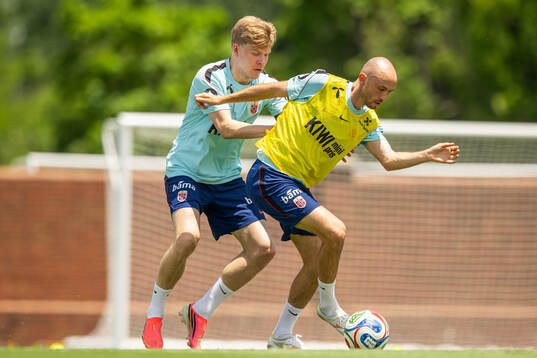 Jens Petter Hauge and Fredrik Aursnes of the Norwegian