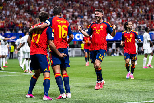 Mikel Oyarzabal of Spain celebrates with Rodri and Aymeric