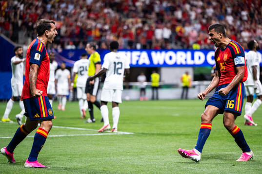 Mikel Oyarzabal of Spain celebrates with Rodri
