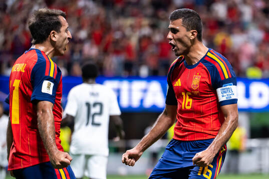 Mikel Oyarzabal of Spain celebrates with Rodri