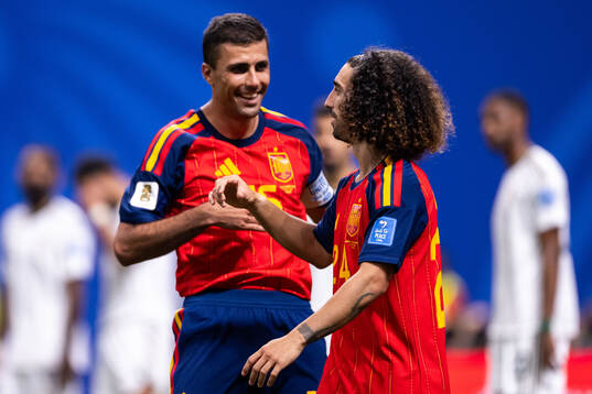 Marc Cucurella of Spain celebrates with Rodri