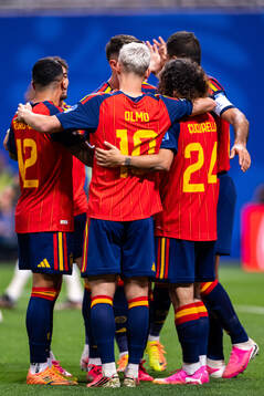 Marc Cucurella of Spain celebrates with team mates