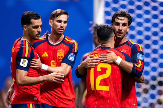 Ferran Torres of Spain celebrates with Fabian Ruiz and