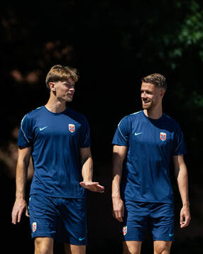 Henrik Falchener and Kristoffer Ajer of the Norwegian