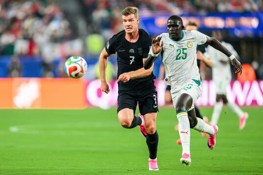 Alexander Sørloth of Norway and El Hadji Malick Diouf of