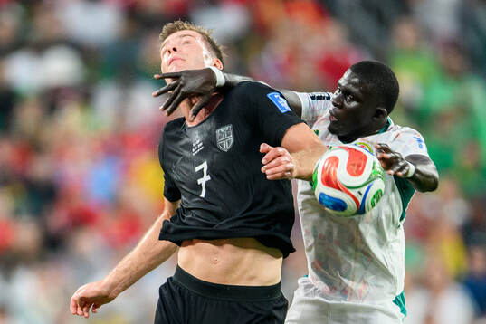 Alexander Sørloth of Norway and El Hadji Malick Diouf of
