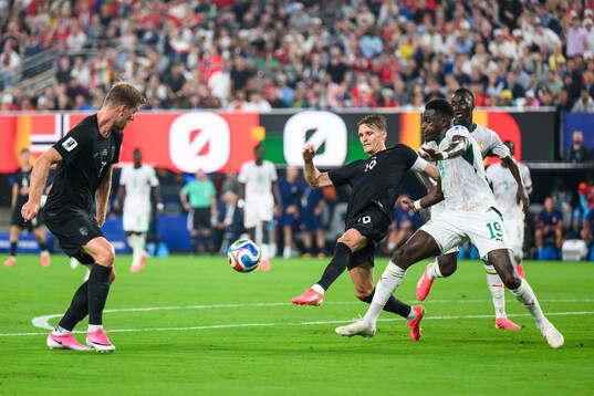 Alexander Sørloth and Martin Ødegaard of Norway against