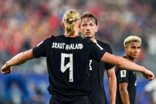 Erling Braut Haaland and Sander Berge of Norway celebrate