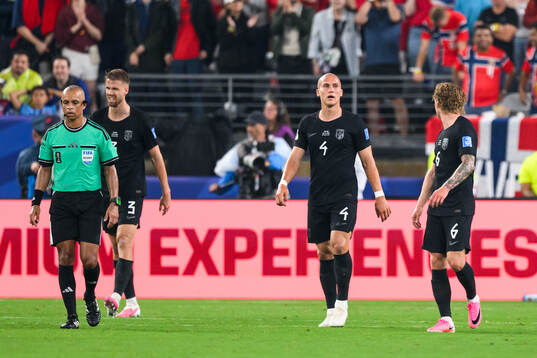 Players of Norway look dejected