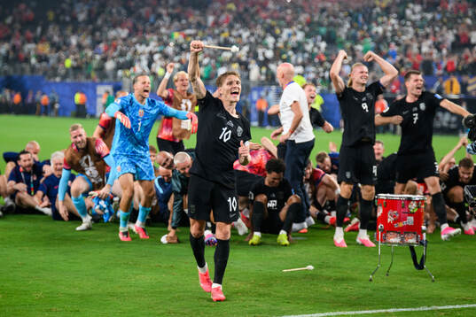 Martin Ødegaard of Norway celebrates