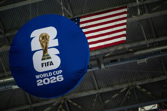 FIFA World Cup 2026 logo infront of the American flag