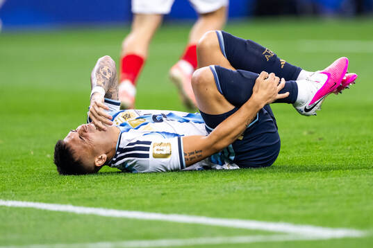 Lautaro Martinez of Argentina in pain