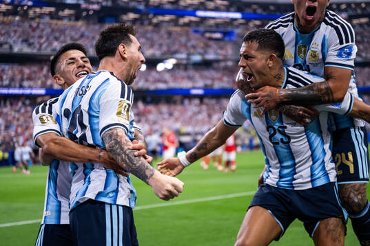 Lionel Messi of Argentina celebrates with Enzo Fernandez,