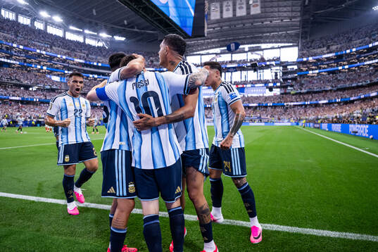 Lionel Messi of Argentina celebrates with Lautaro Martinez,