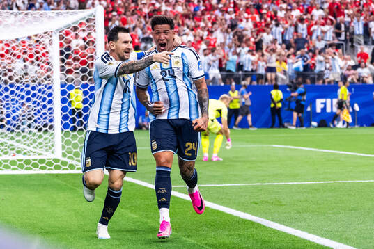Lionel Messi of Argentina celebrates with Enzo Fernandez