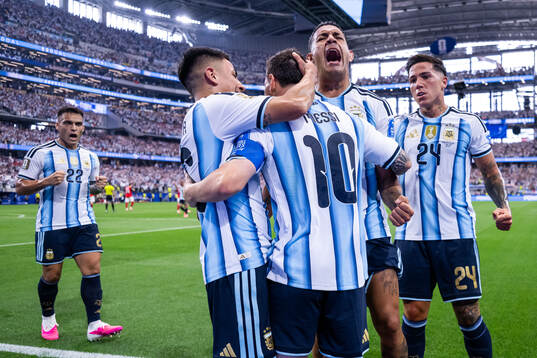 Lionel Messi of Argentina celebrates with Lautaro Martinez,