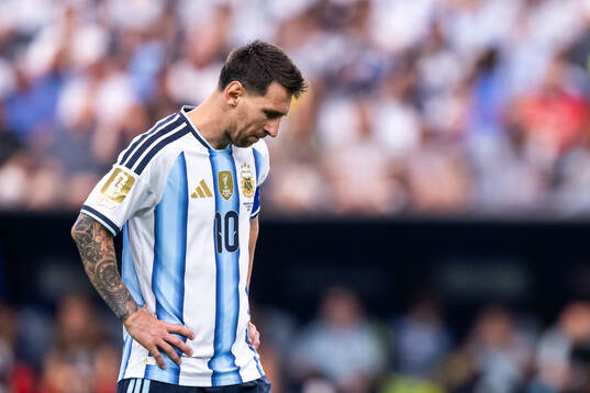 Lionel Messi of Argentina looks dejected