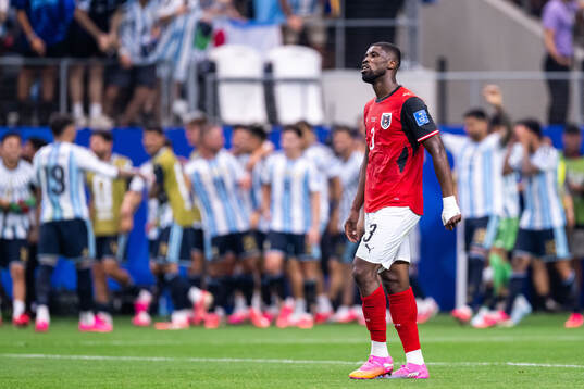 Kevin Danso of Austria looks dejected