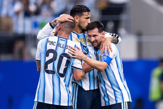 Alexis Mac Allister, Leandro Paredes and Lionel Messi of
