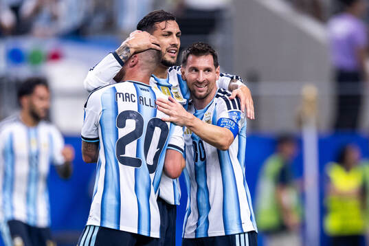 Alexis Mac Allister, Leandro Paredes and Lionel Messi of