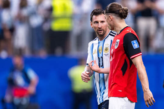 Lionel Messi of Argentina and Marcel Sabitzer of Austria
