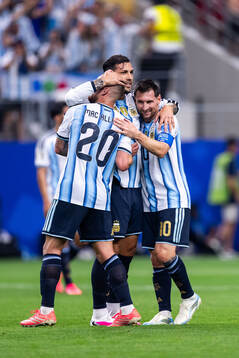 Alexis Mac Allister, Leandro Paredes and Lionel Messi of
