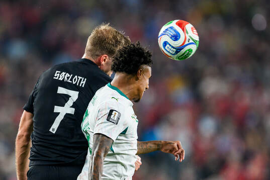 Alexander Sørloth of Norway and Ismail Jakobs of Senegal
