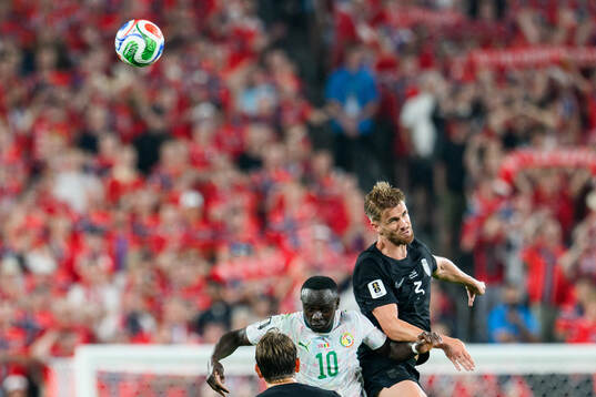 Sadio Mane of Senegal and Kristoffer Ajer of Norway