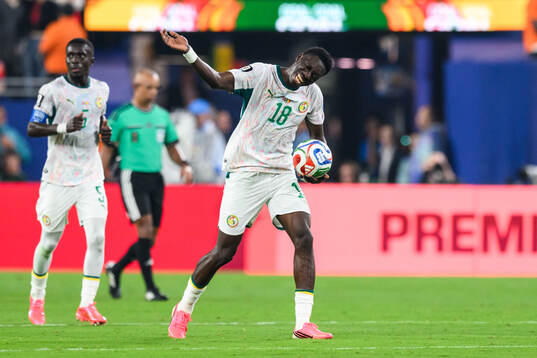 Ismaila Sarr of Senegal celebrates