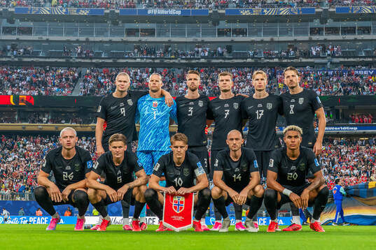 The starting eleven of Norway pose for a team photo