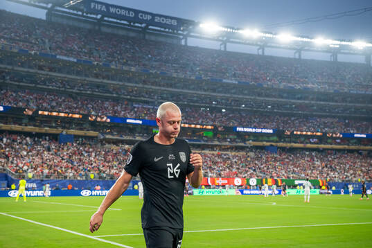 Julian Ryerson of Norway walks off with an injury