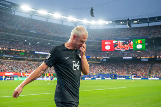 Julian Ryerson of Norway walks off with an injury