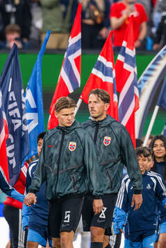 David Møller Wolfe and Sander Berge of Norway enter the