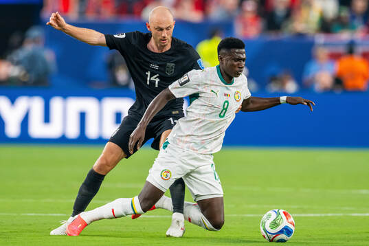 Fredrik Aursnes of Norway and Lamine Camara of Senegal