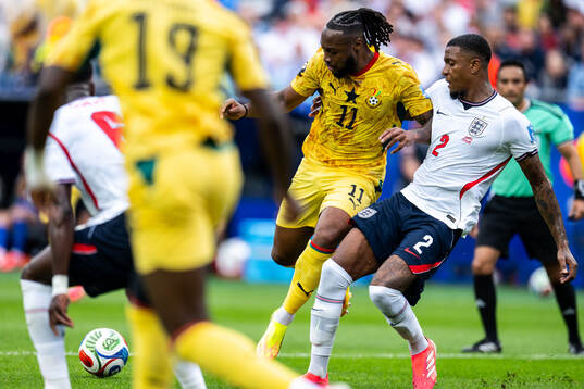 Antoine Semenyo of Ghana and Ezri Konsa of England