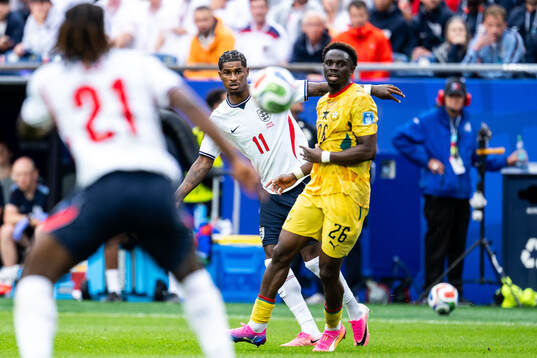 Marcus Rashford of England and Marvin Senaya of Ghana
