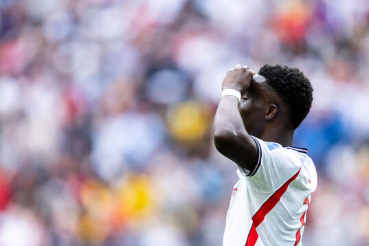 Bukayo Saka of England looks dejected