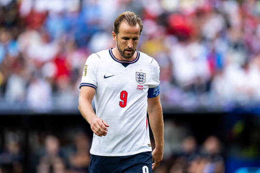 Harry Kane of England looks dejected