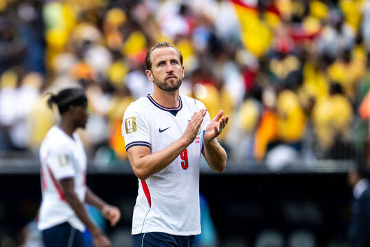 Harry Kane of England looks dejected