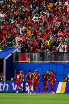 Cristiano Ronaldo of Portugal celebrates with team mates