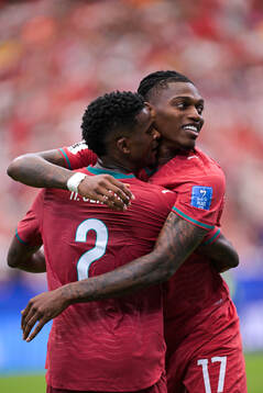 Rafael Leao and Nelson Semedo of Portugal celebrate