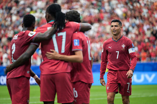 Rafael Leao of Portugal celebrates with Cristiano Ronaldo