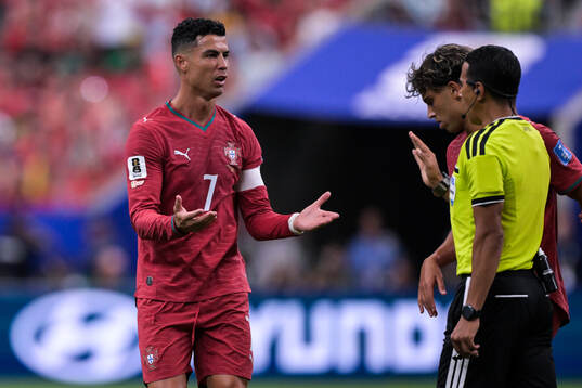 Cristiano Ronaldo of Portugal reacts towards referee Jalal
