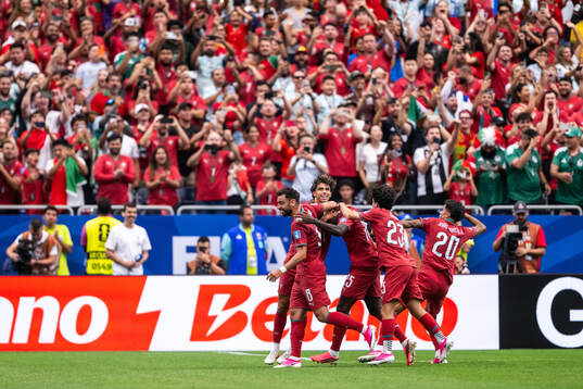 Nuno Mendes of Portugal celebrates with Joao Felix, Bruno